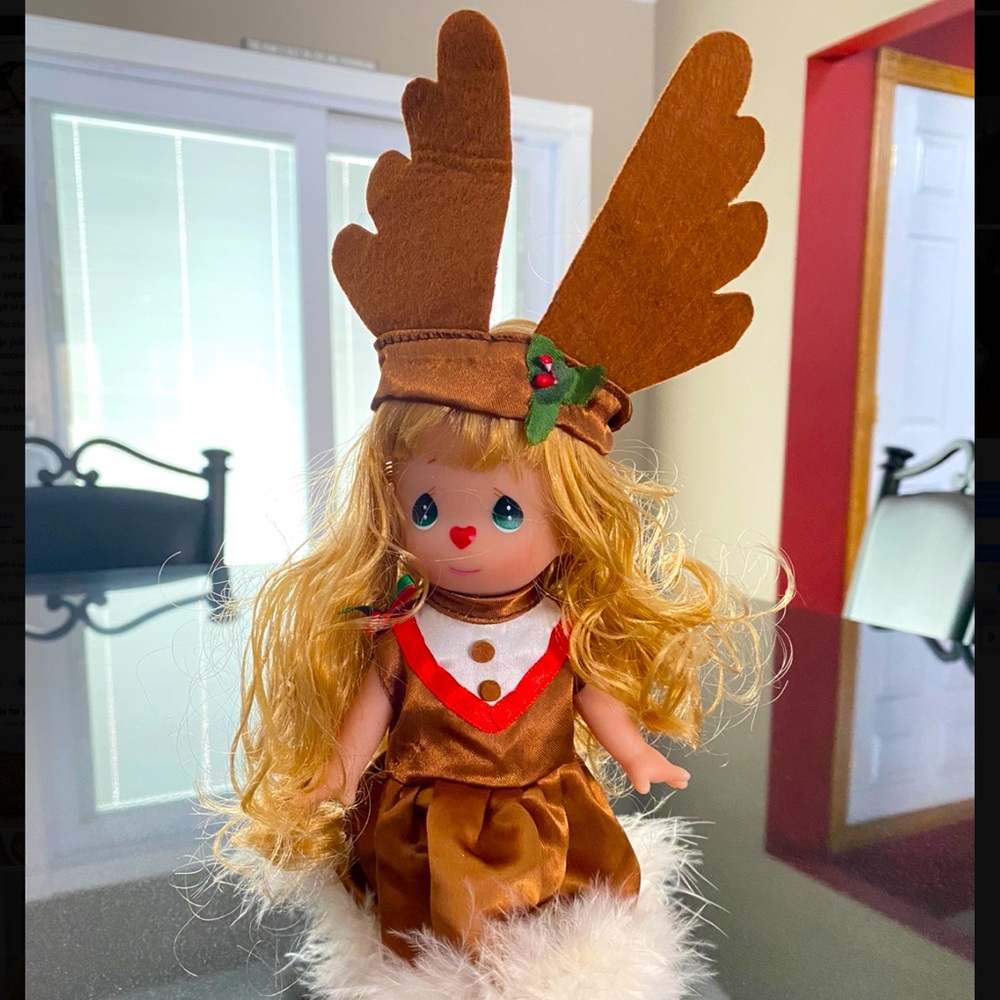 Precious moments reindeer doll.